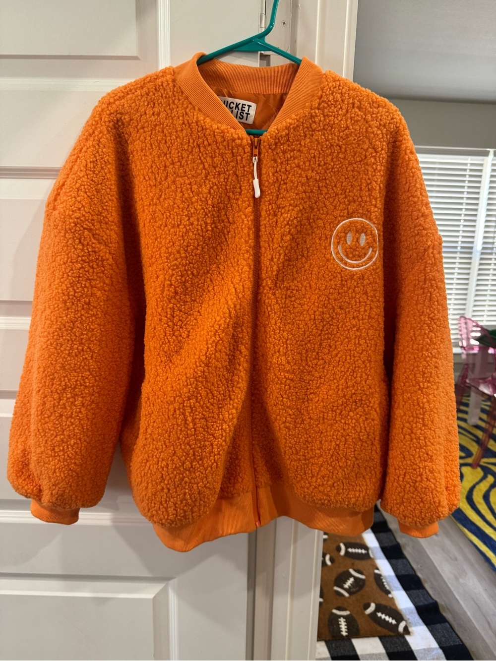 BUCKETLIST Orange Sherpa Zip-Up Jacket with Smiley Patch
